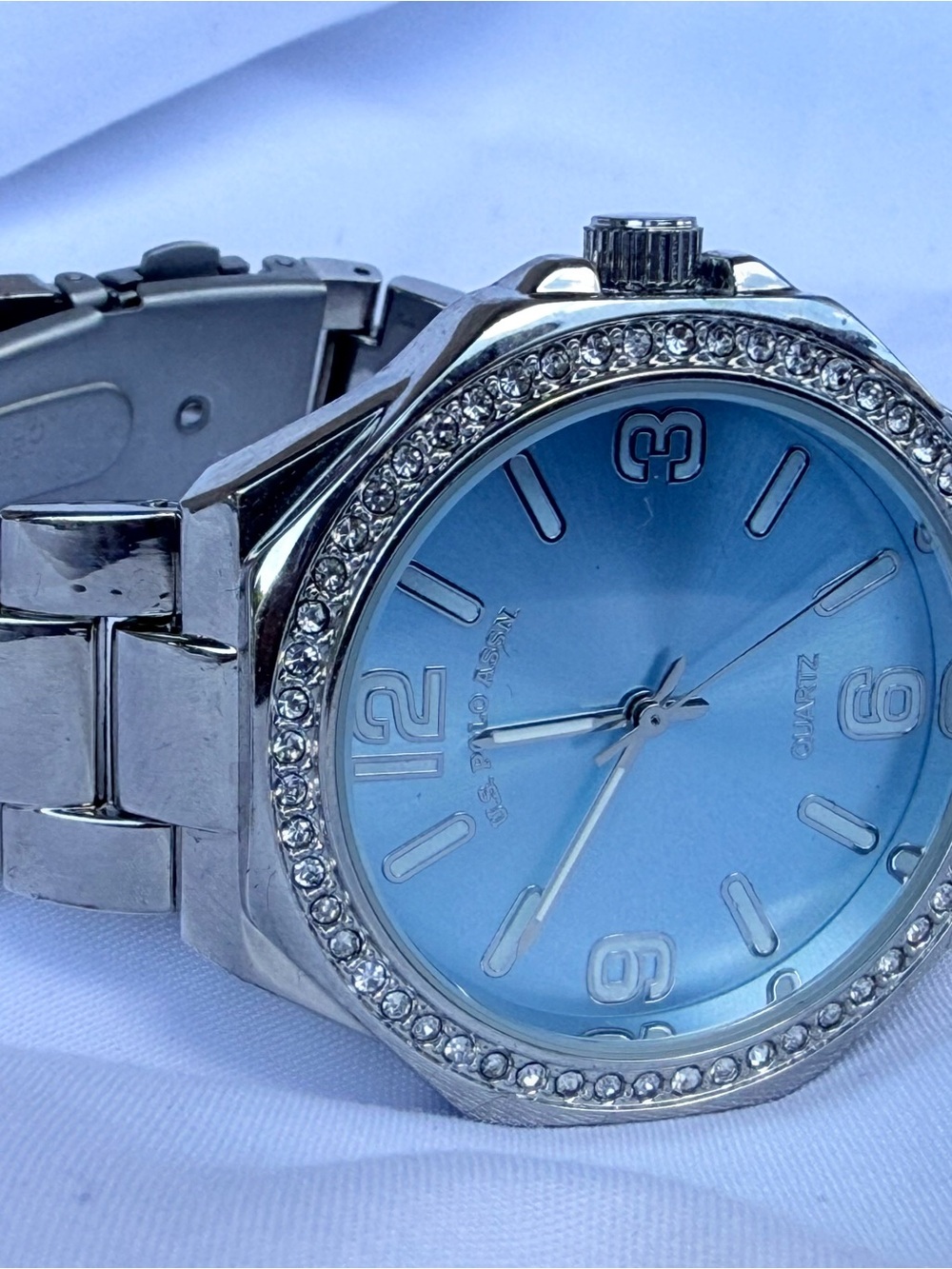 U.S. Polo Assn. Silver Watch with Light Blue Dial and Crystal Bezel